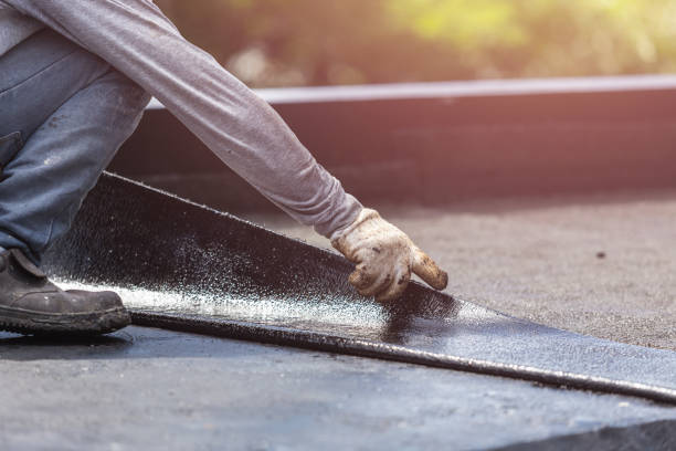 Professional Waterproofing technician working in Branchport, NY